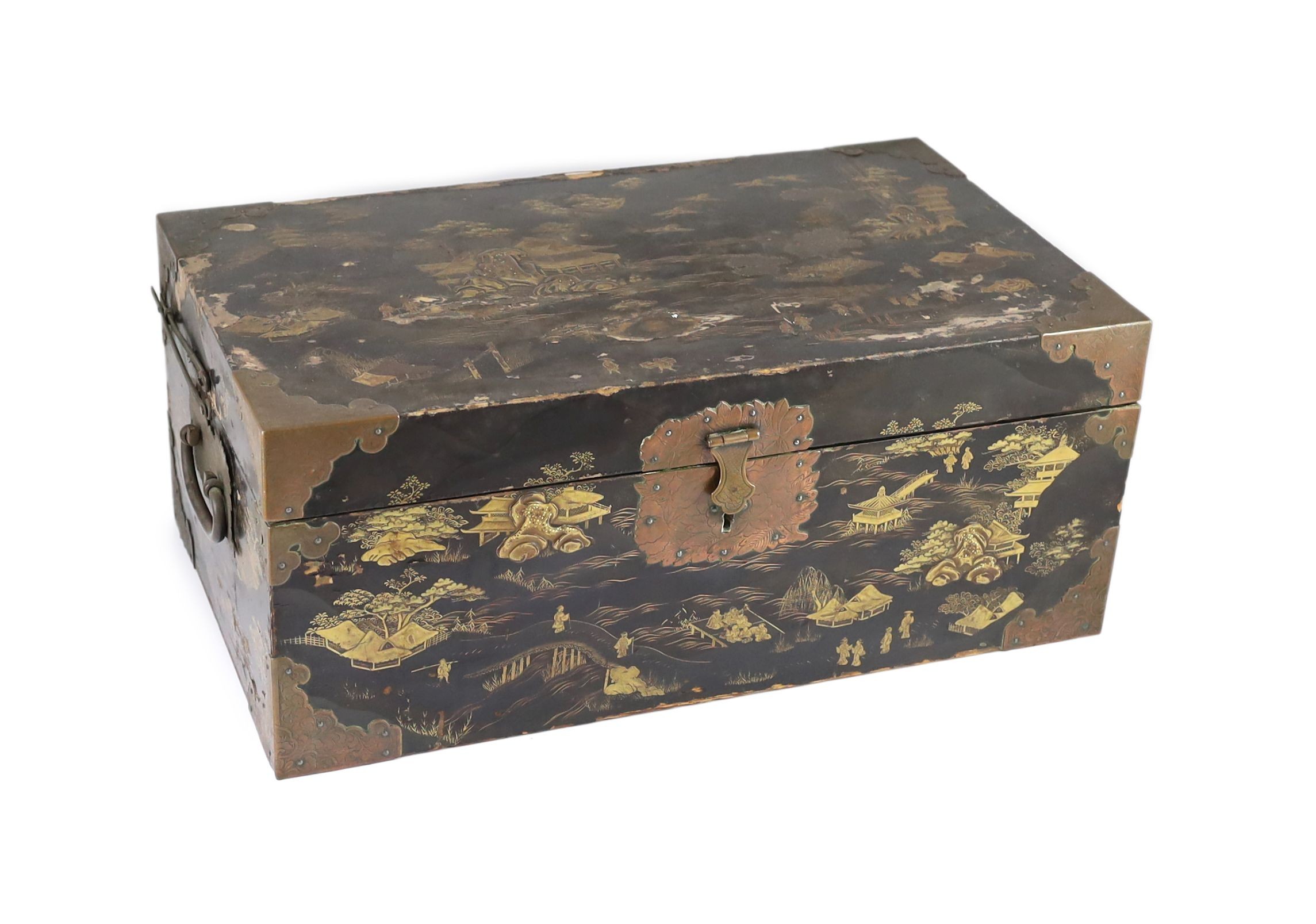 A Japanese lacquer fitted travelling trunk, 19th century, 55cm wide, H 23cm. D 32cm. Some losses to lacquer and wear to mounts